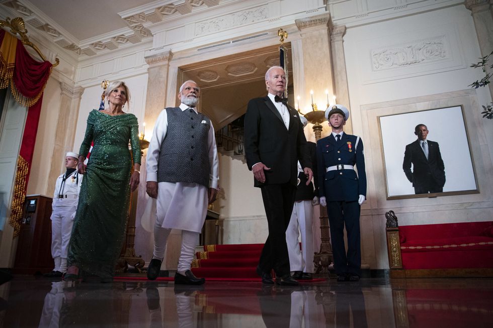 Image of U.S. President Joe Biden, Indian Prime Minister Narendra Modi and First Lady Jill Biden heading to a dinner in the White House on June 22 as part of Modi's U.S. visit.