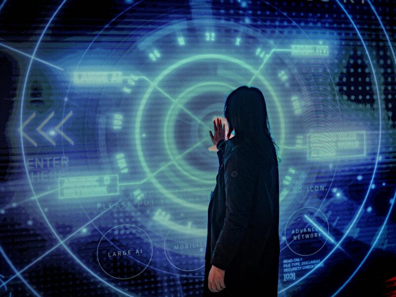 Image of woman interacting with a smart screen during the GSMA Mobile World Congress