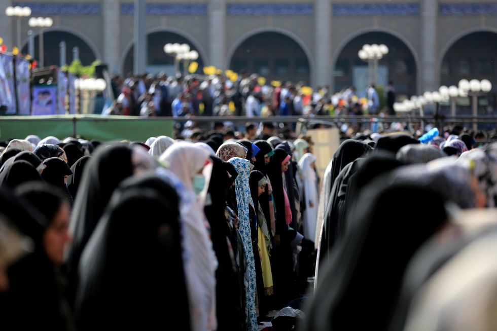 Image of women performing Eid al-Fitr Prayer at Grand Mosalla mosque of Tehran, Iran.