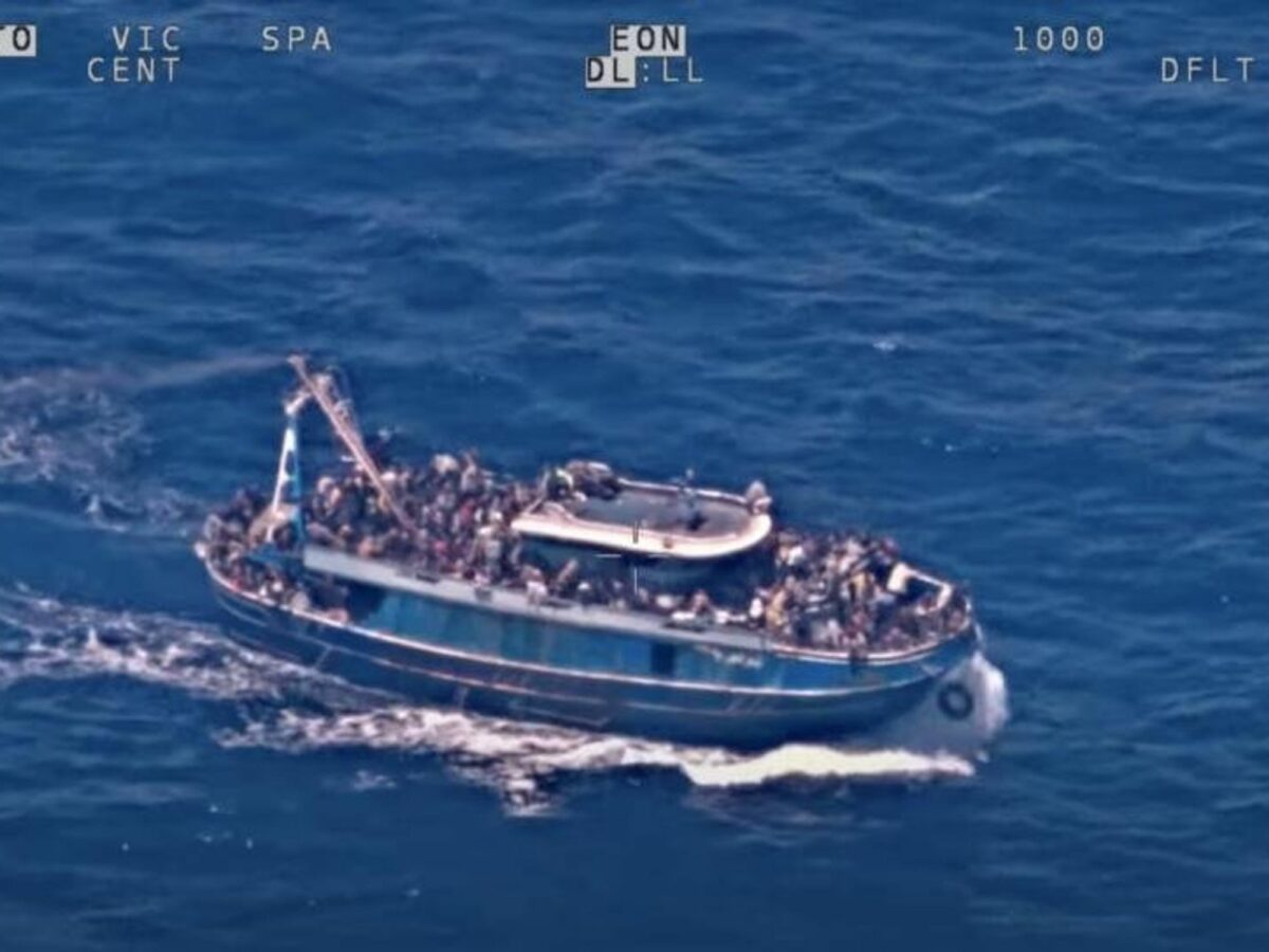 image showing a screenshot of footage from EU border agency Frontex shows overloaded ship before capsizing.