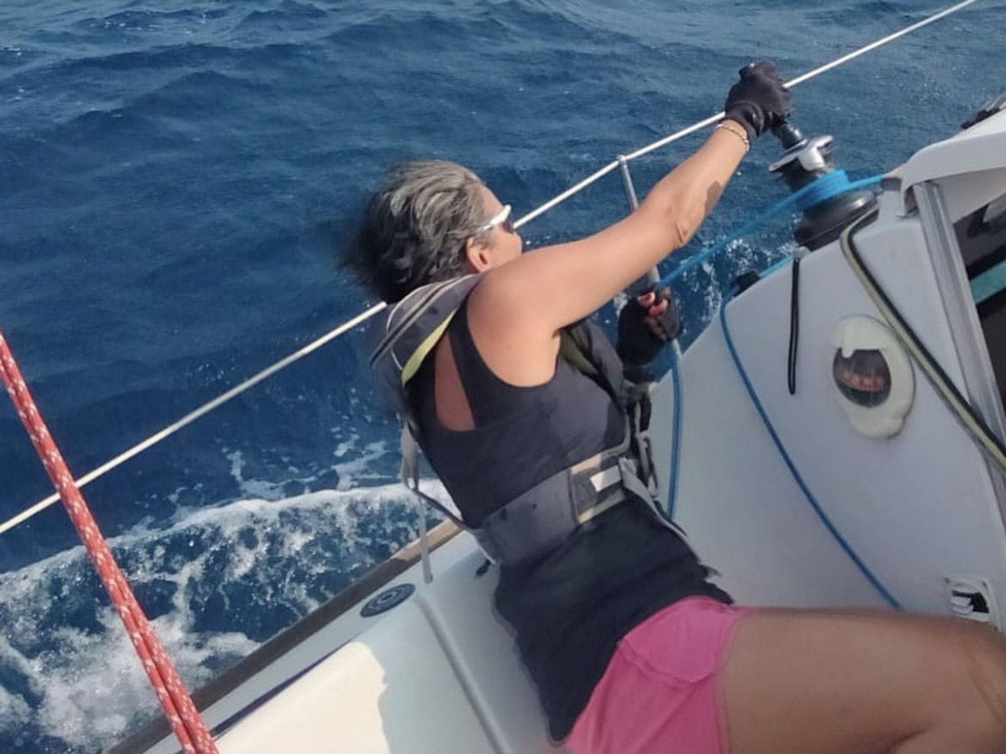 image showing a woman as she practices sailing.
