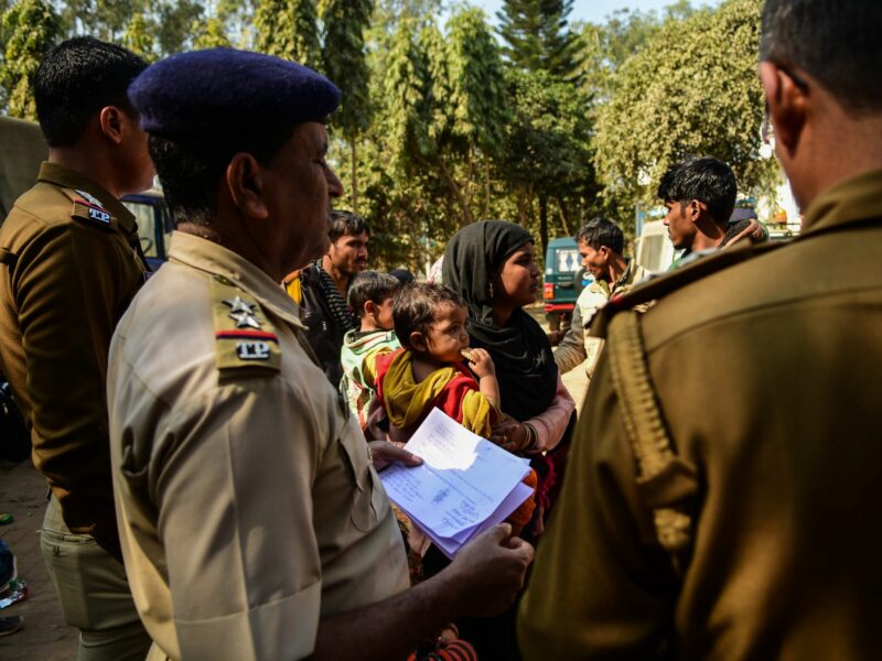 Image showing Rohingya immigrants who were stranded on the India-Bangladesh border for three days being held at the Amtali Police Station.