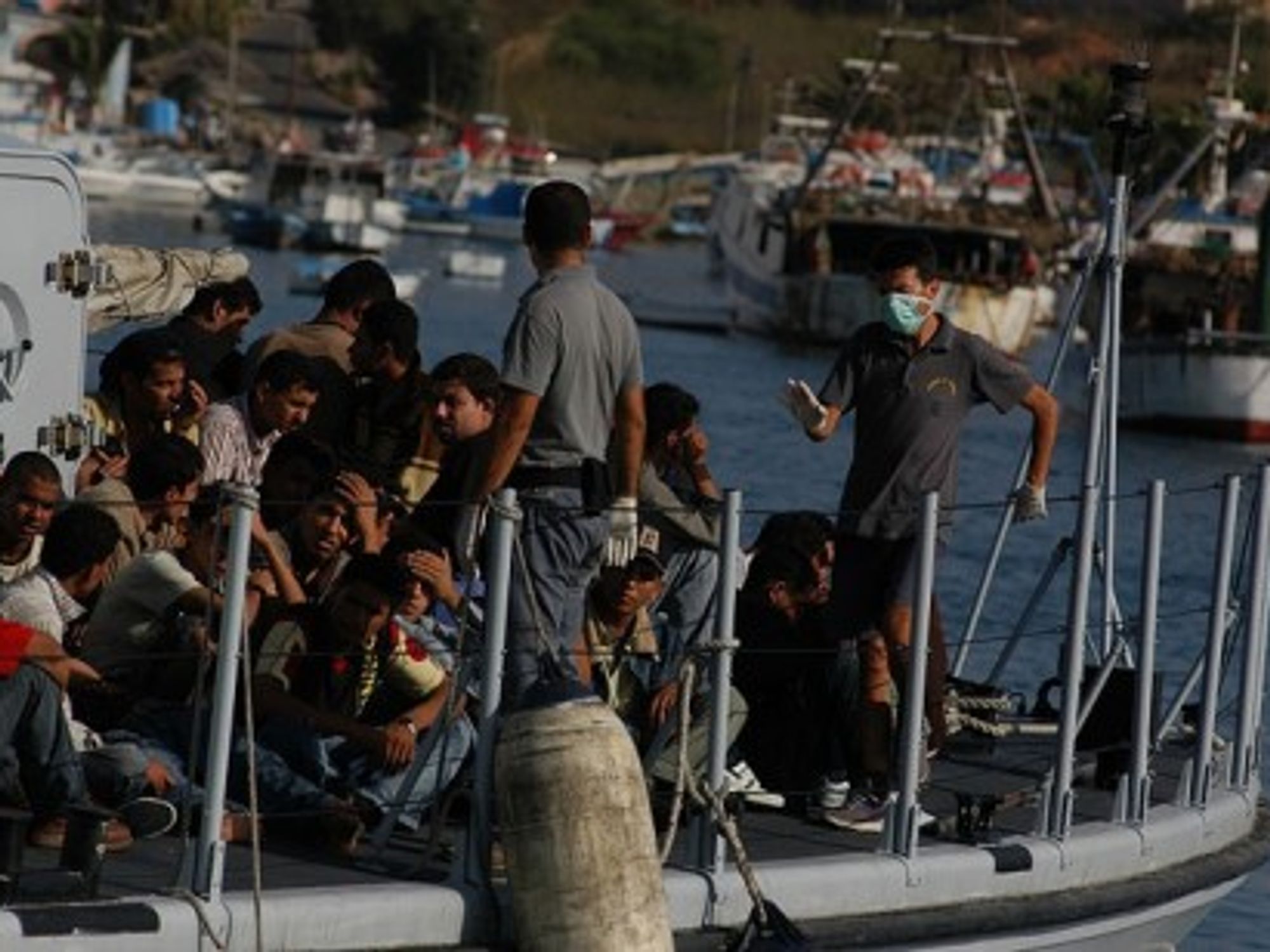 Immigrants in the port of Lampedusa