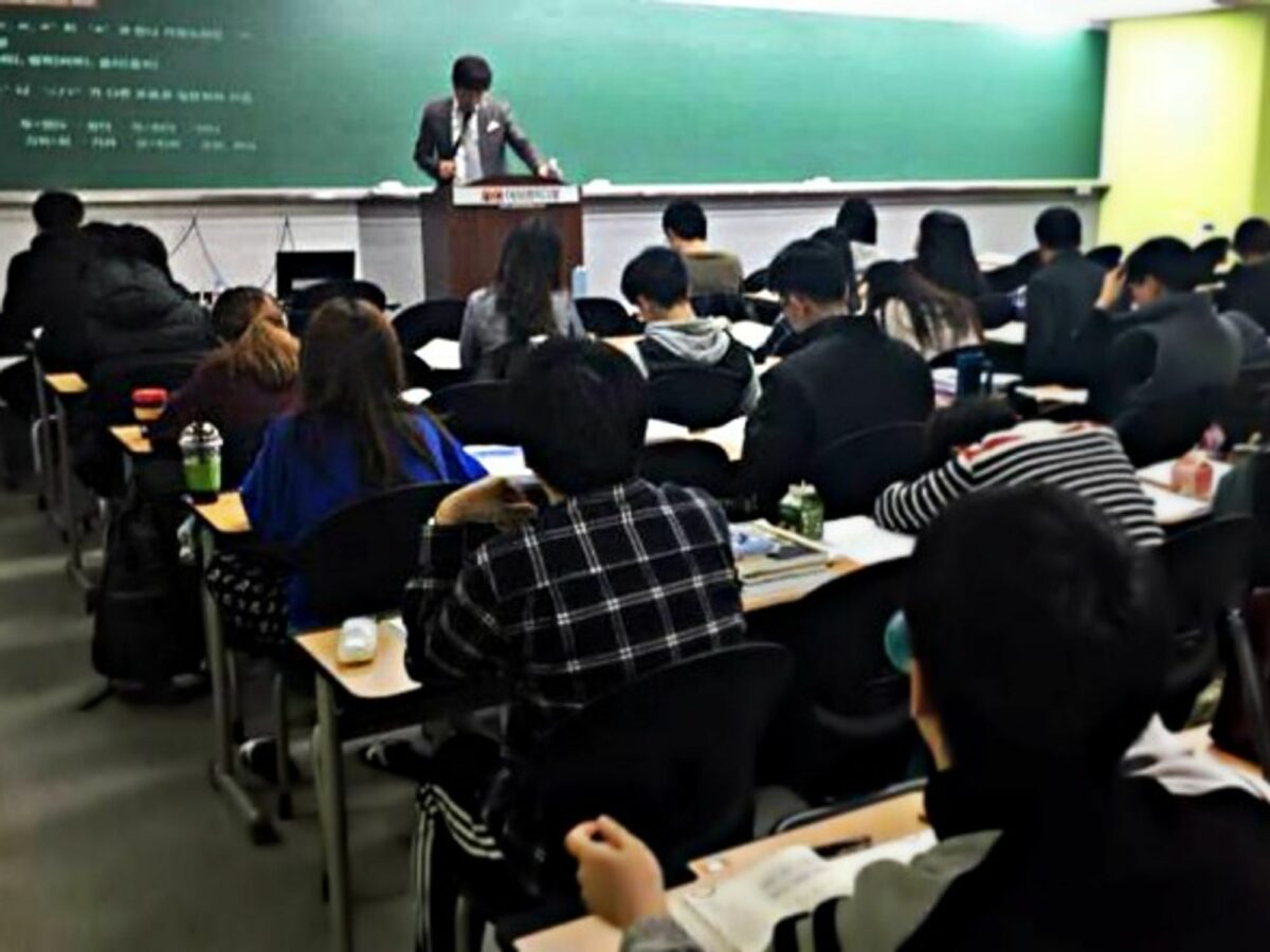 In a classroom in Seoul, students study for an exam