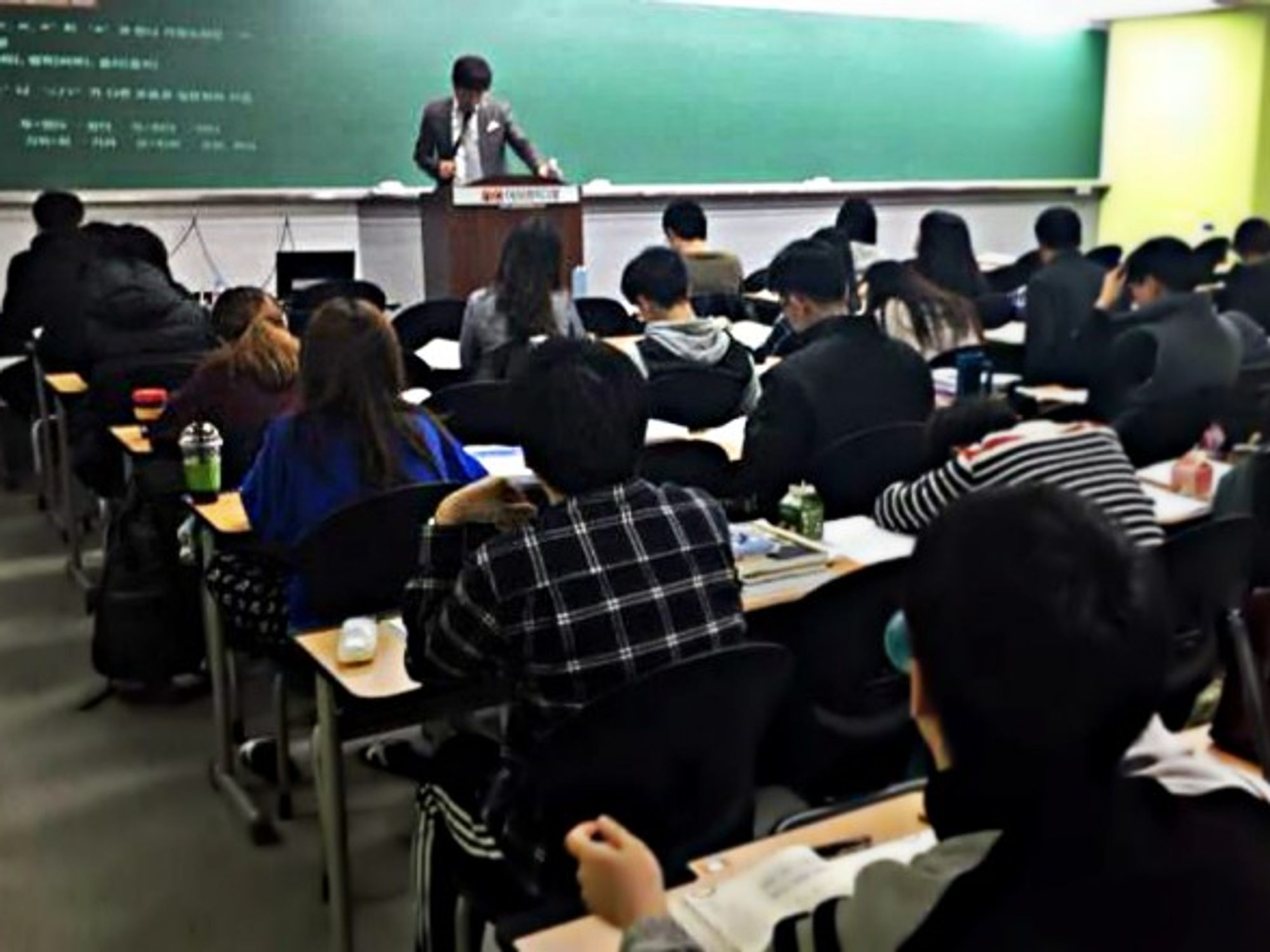 In a classroom in Seoul, students study for an exam
