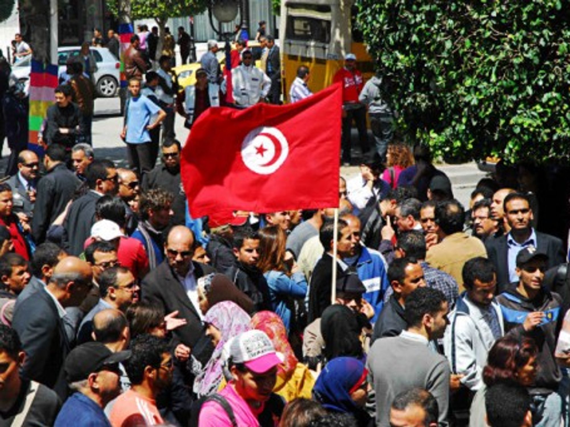 In a file photo, Tunisians rally for freedom of expression.