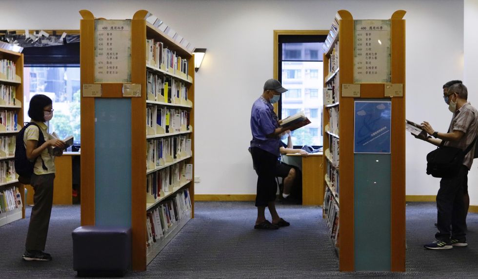 In a Hong Kong library, where the government has initiated a move to ban all books that are considered by authority as detrimental to the Chinese Communist rule