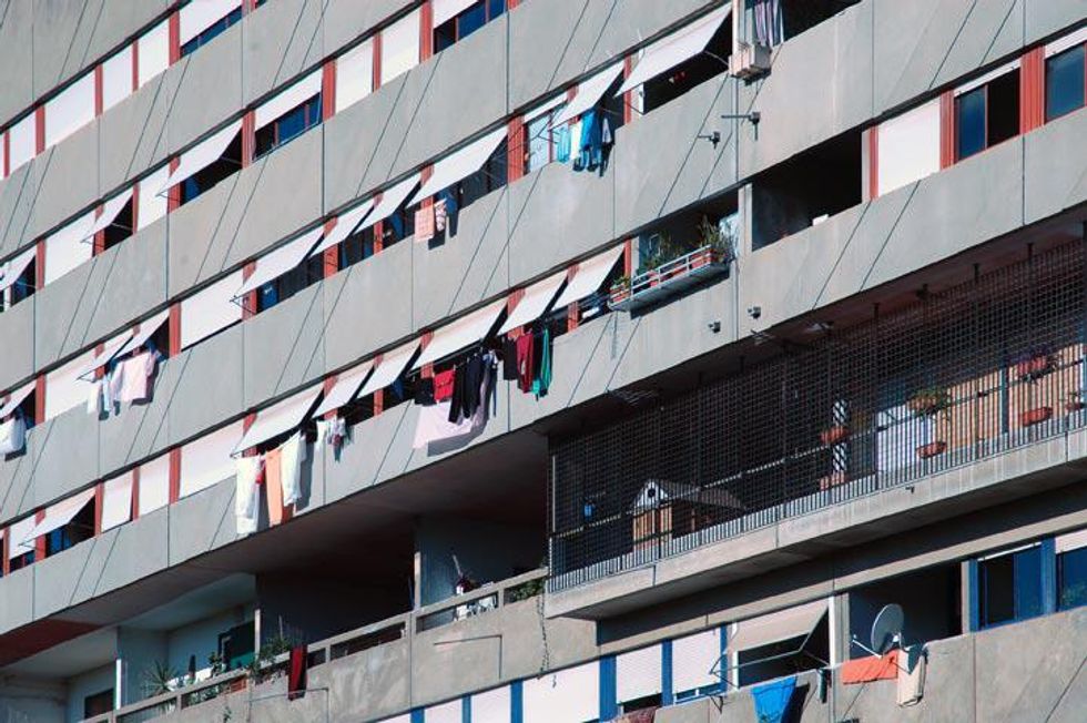 In Corviale, architect Mario Fiorentino designed and built the "serpentone," a concrete building of 1,260 apartments