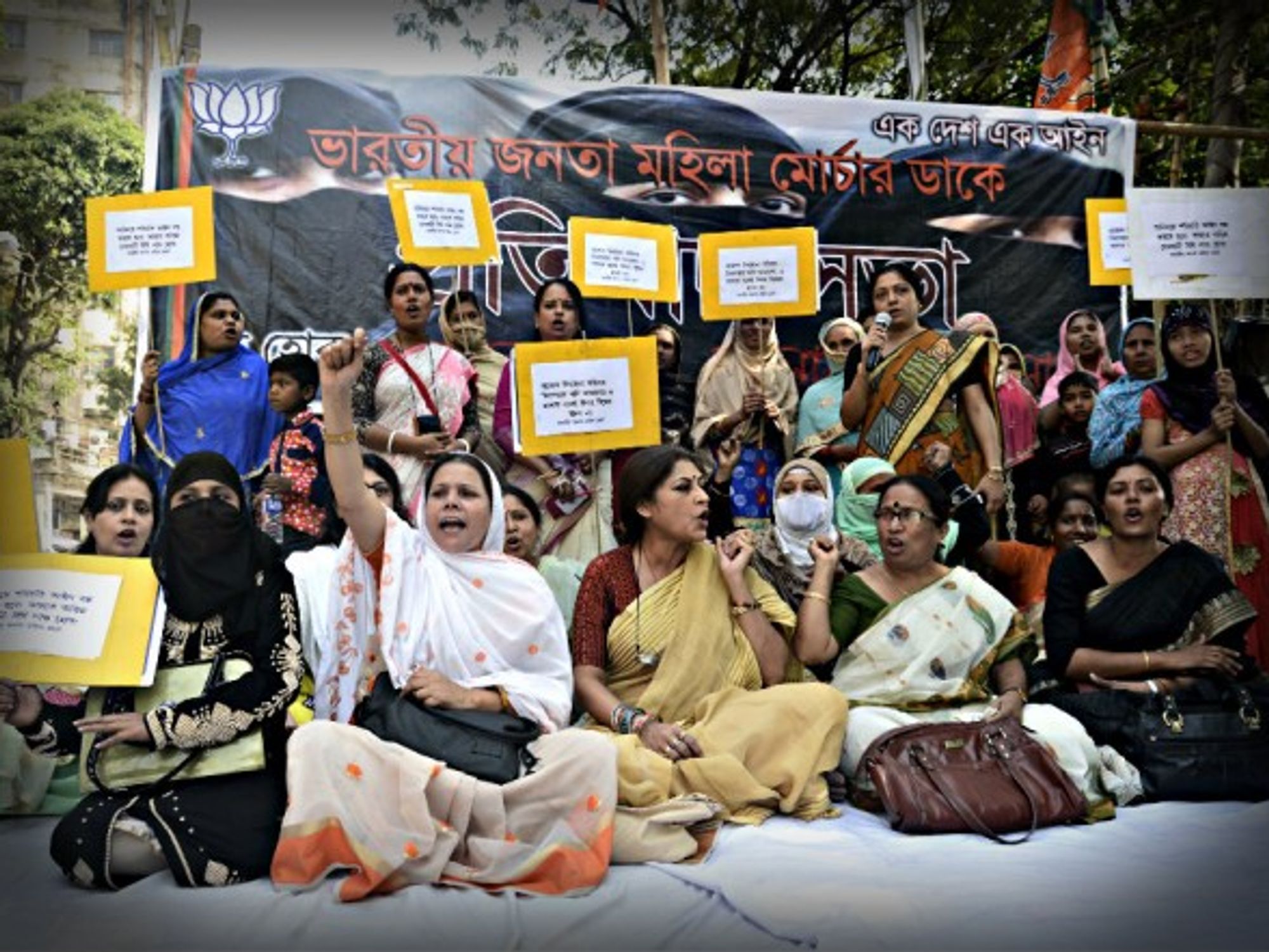 In India, Muslim women hold poster to protest Triple talaq divorce practice