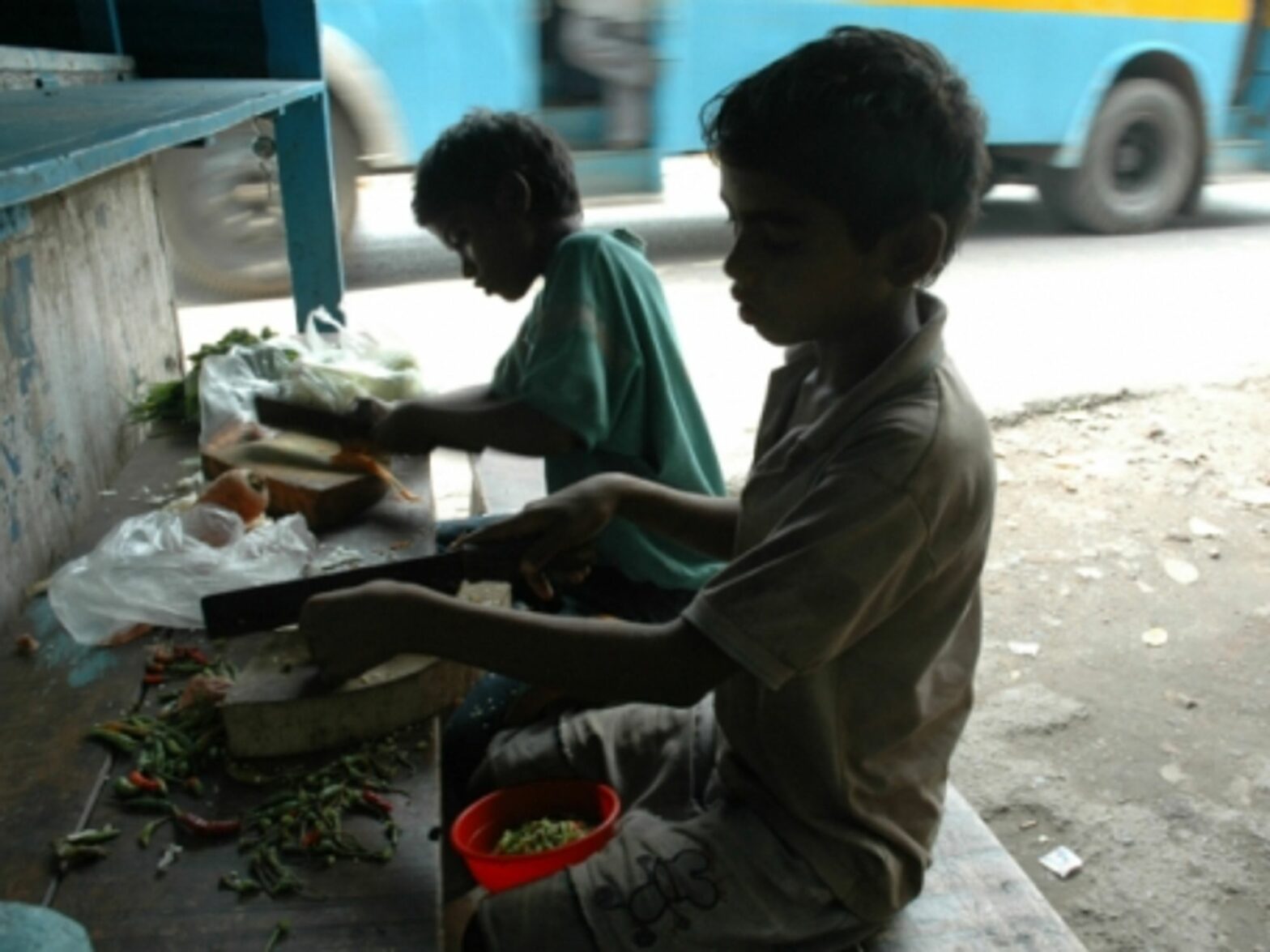 India children working on the side of a road in West Bengal