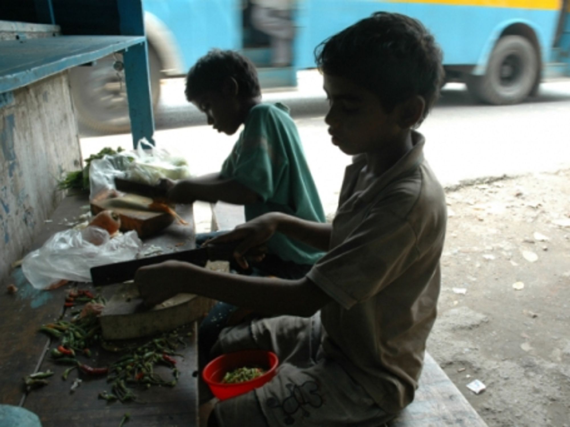 India children working on the side of a road in West Bengal