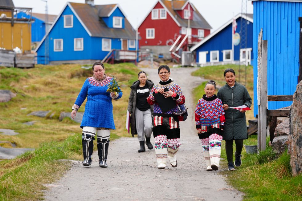 Inhabitants of Attu in traditional clothes