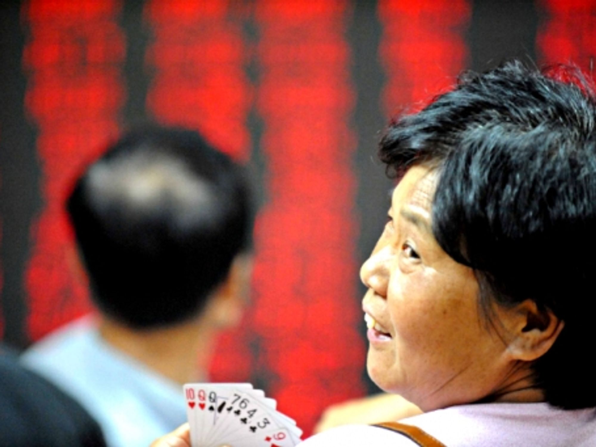 Investors are seen in a stock trading hall in Beijing, China, in 2009.