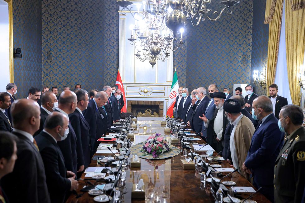 Iranian and Turkish delegations.