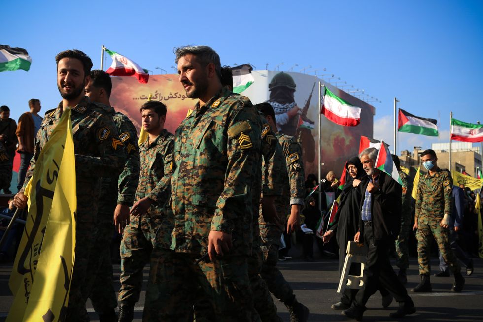 Iranian anti-riot police officers attend an anti-Israeli rally to show their solidarity with the people of Gaza at Enqelab-e Eslami Square in Tehran.