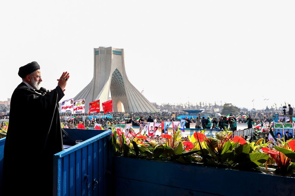 Iranian president EBRAHIM RAISI greeting the crowd during the celebrations for the 45th anniversary of the Islamic Revolution, in Tehran.