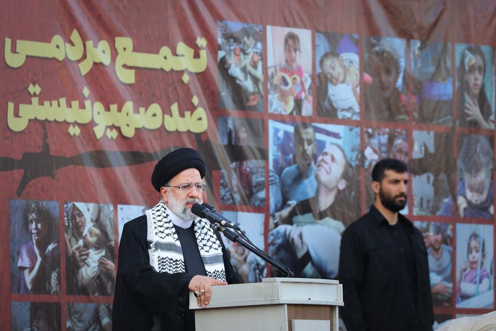 Iranian President Ebrahim Raisi speaks Thursday at a Pro-Palestine rally in Tehran to show their solidarity with Gaza people after the Gaza hospital strike.