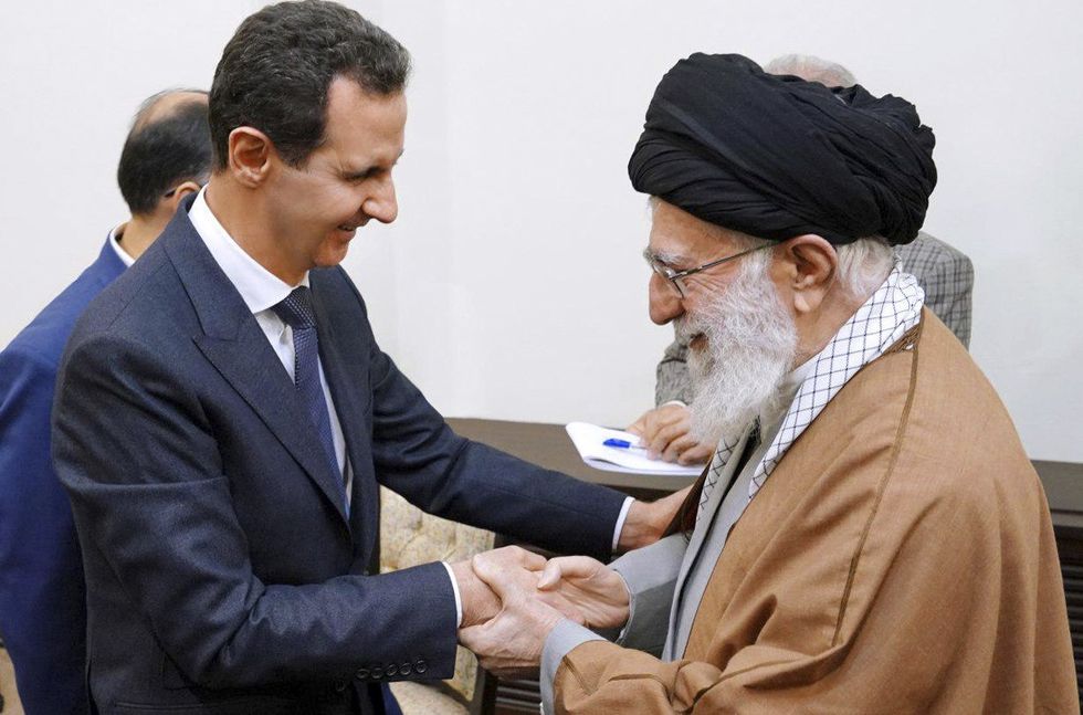 Iran's Supreme Leader Ayatollah Ali Khamenei meets with visiting Syrian President Bashar al-Assad in Tehran, Iran, on February 25, 2019.