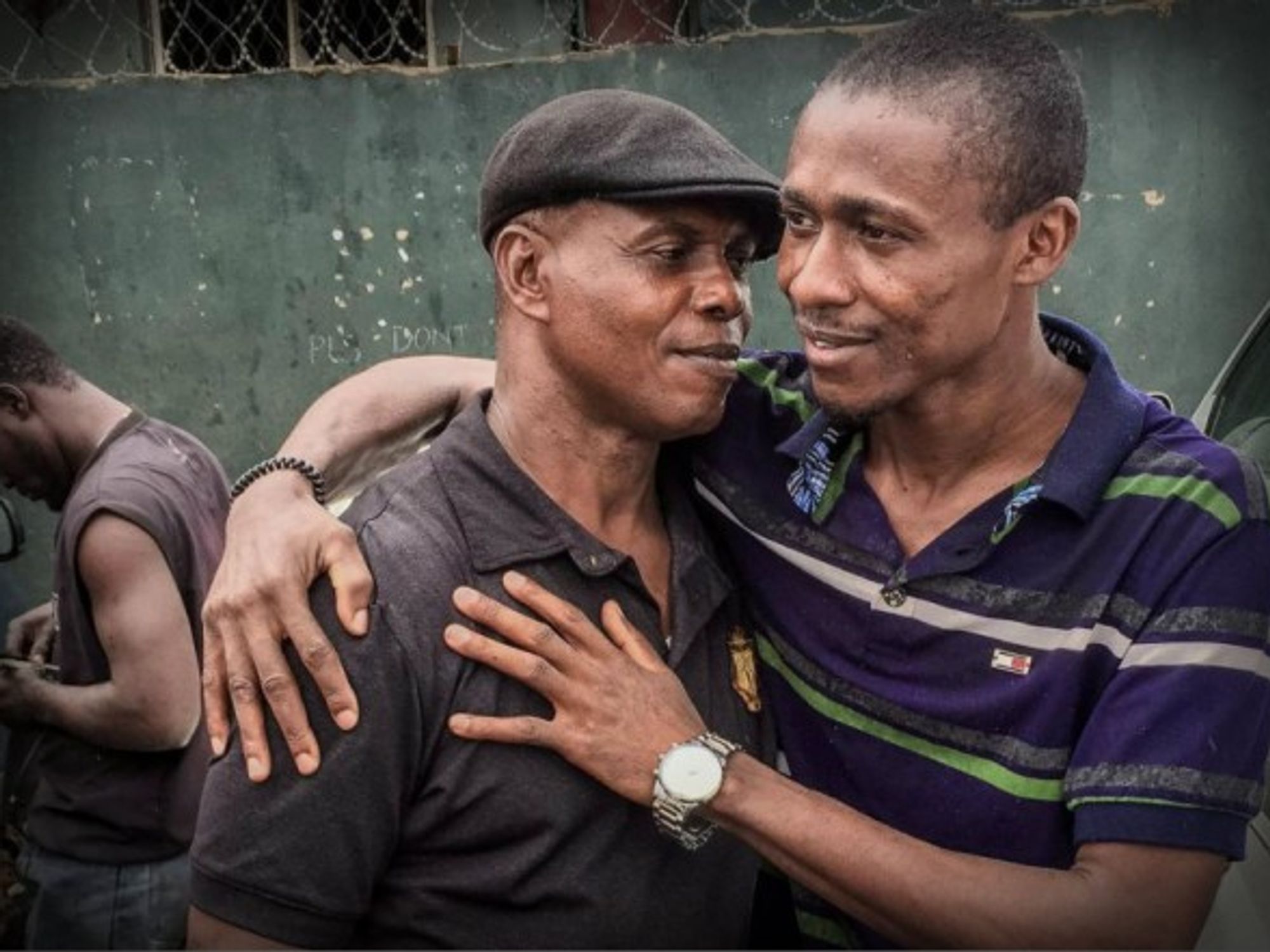 Isaac (right) is about 15 kg lighter than before leaving Nigeria