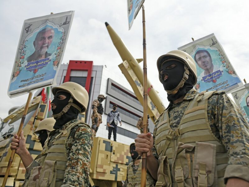 Islamic Revolutionary Guard Corps (IRGC) members in front of a ''Khaibar-buster'' missile during the annual pro-Palestinian Al-Quds, or Jerusalem, Day rally in Tehran, Iran, Friday, April 29, 2022
