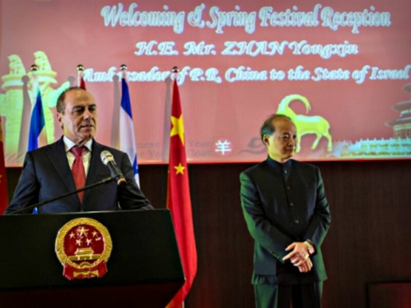 Israeli Minister of National Infrastructures Silvan Shalom and Chinese Ambassador Zhan Yongxin in Tel Aviv on Feb. 11