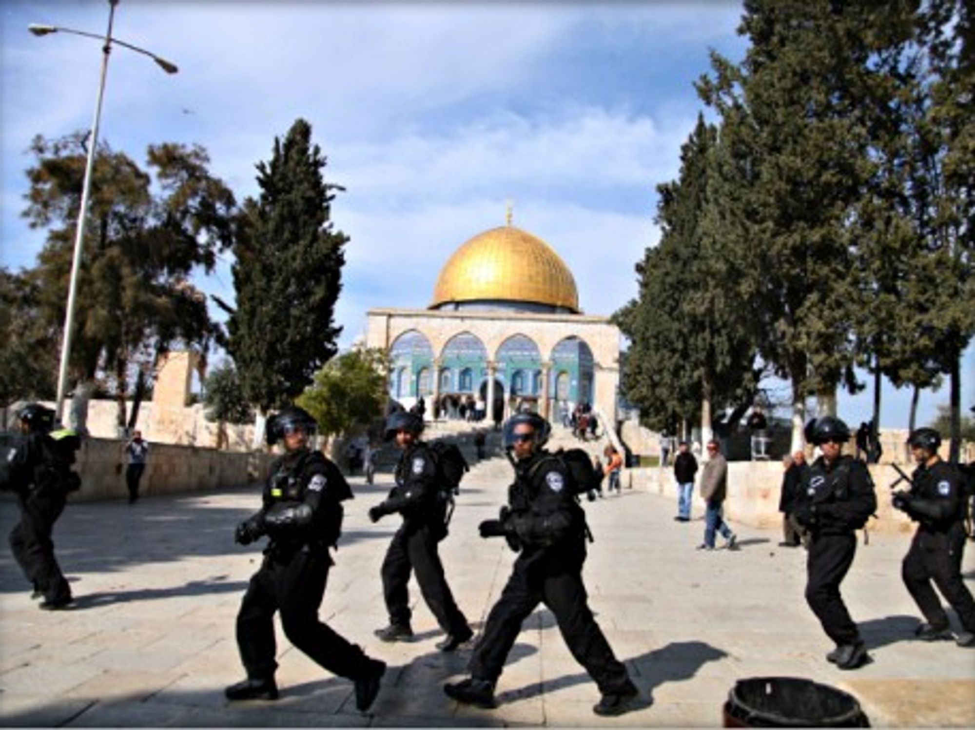 Israeli policemen in front of Jerusalem's Dome of the Rock during clashes with Palestinians on Feb. 7