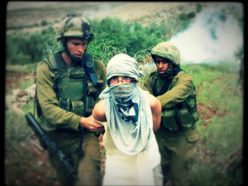 Israeli soldiers arrest an Israeli settler