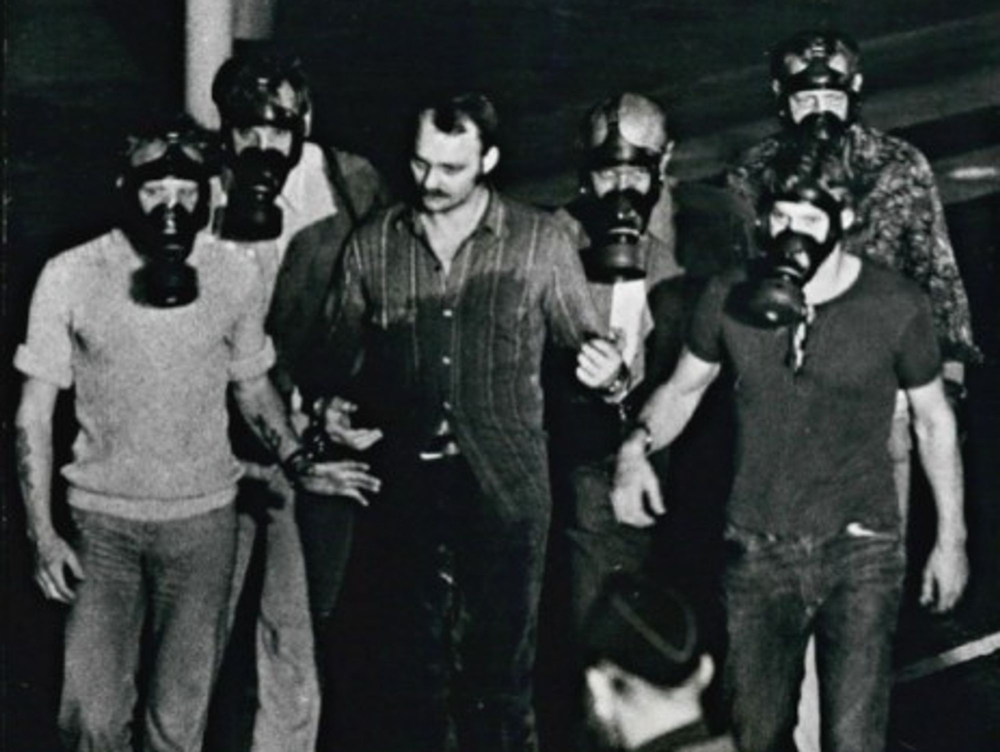 Jan Erik Olsson escorted from the bank after his surrender on Aug. 28 1973