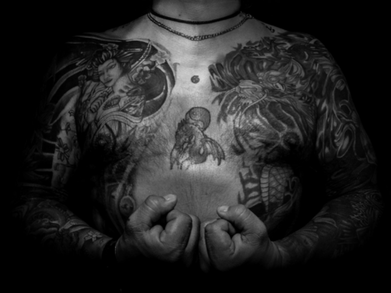 Japanese mafia bosses, famous for their tattoos and for their generosity?