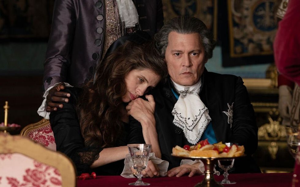 Johnny Depp as Louis XV and Maïwenn as Jeanne du Barry in the movie.