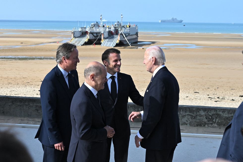 June 6, 2024, Omaha Beach, France: UK Foreign Secretary David Cameron, French President Emmanuel Macron, German Chancellor Olaf Scholz, US President Joe Biden attending D-Day Anniversary International Ceremony at Omaha Beach, Normandy, France on June 6 2024, as part of 80th anniversary of â€˜D-Dayâ (Credit Image: © Abd Rabbo-Blondet-Niviere/Abaca via ZUMA Press)