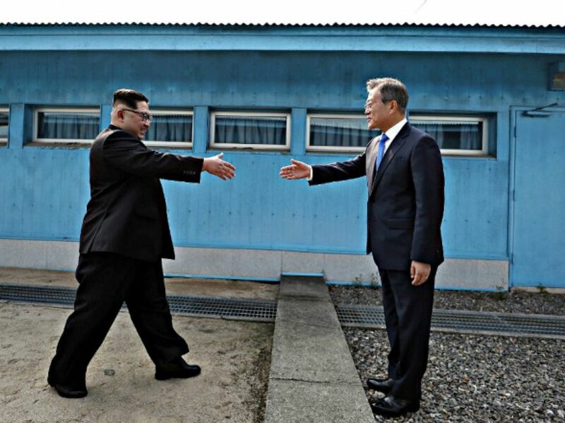 Kim and Moon and a historic handshake
