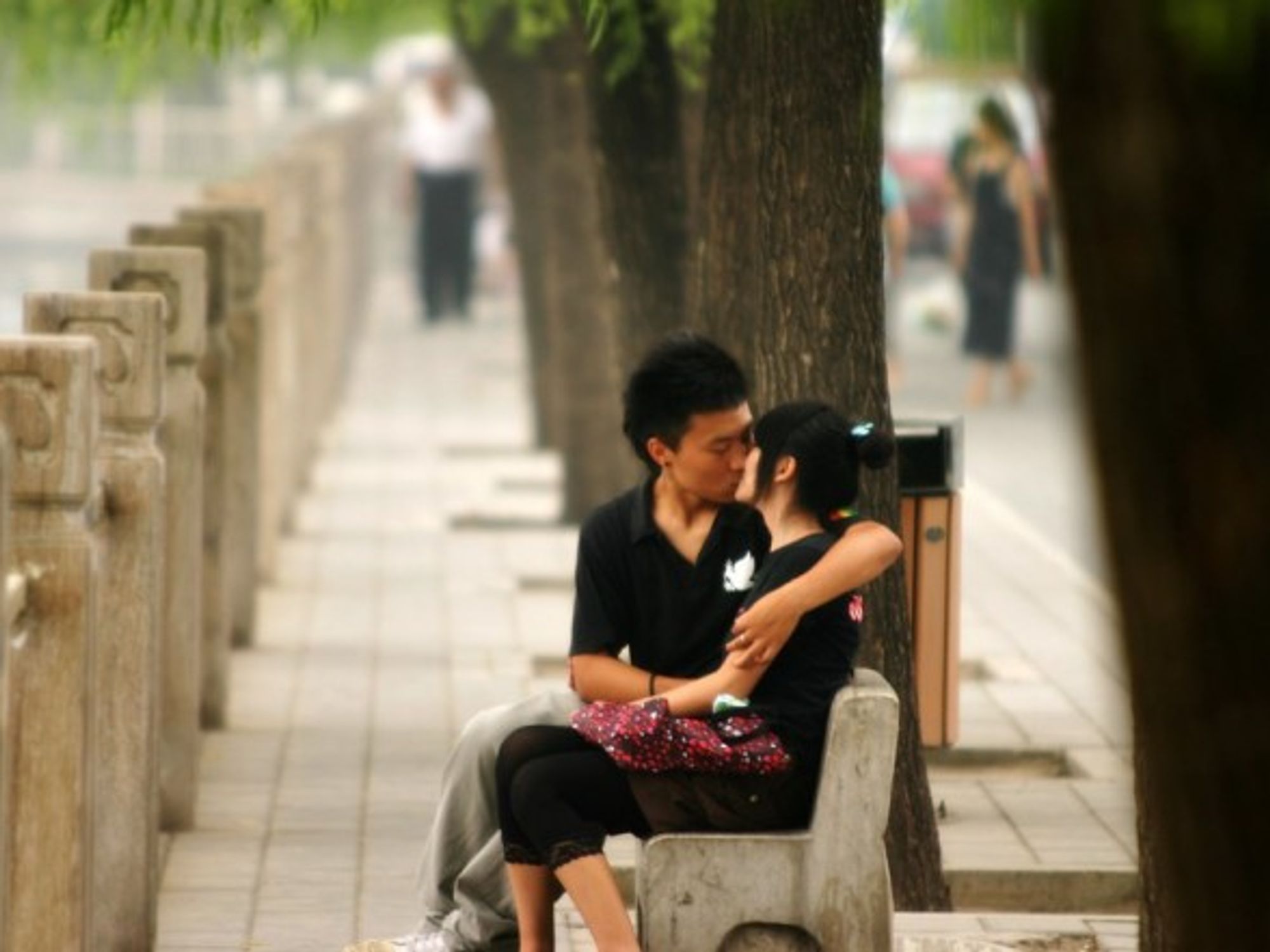 Kiss on a Beijing bench