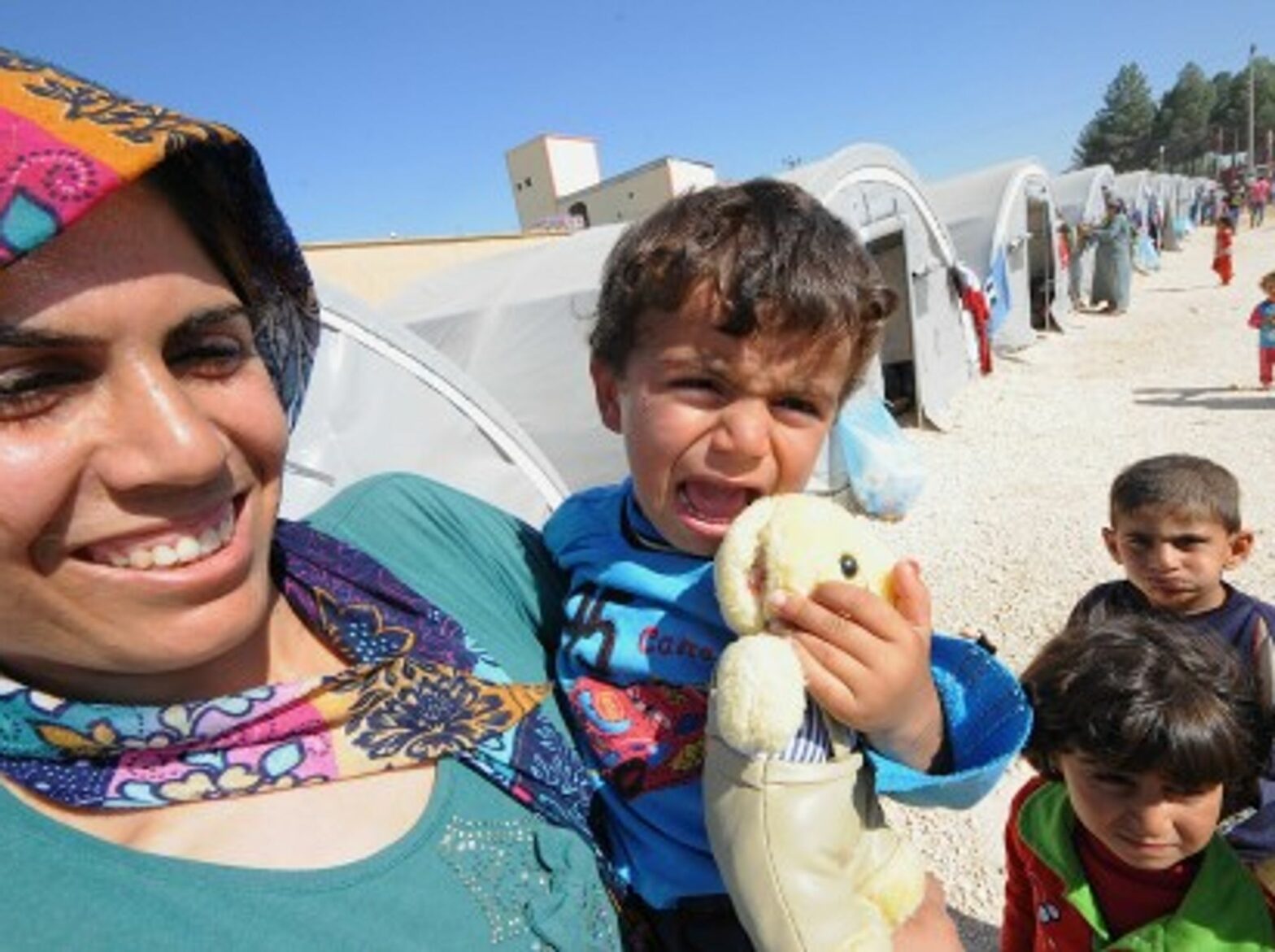 Kurds flee Kobani, Syria for safety in Turkey.