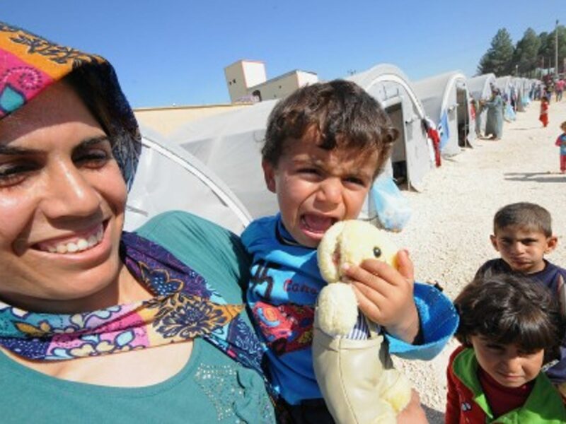 Kurds flee Kobani, Syria for safety in Turkey.