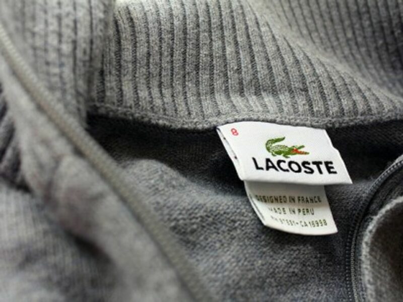 Lacoste, designed in France, made in Peru