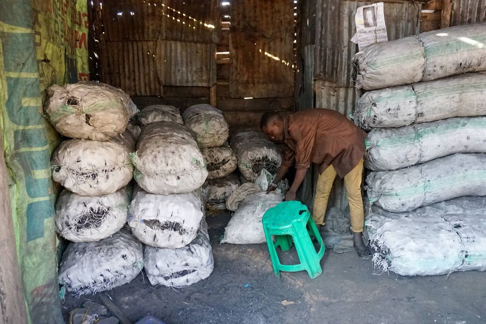 Lawrence Mugerwa, a charcoal seller, raised his prices after the ban, causing his customers to complain.