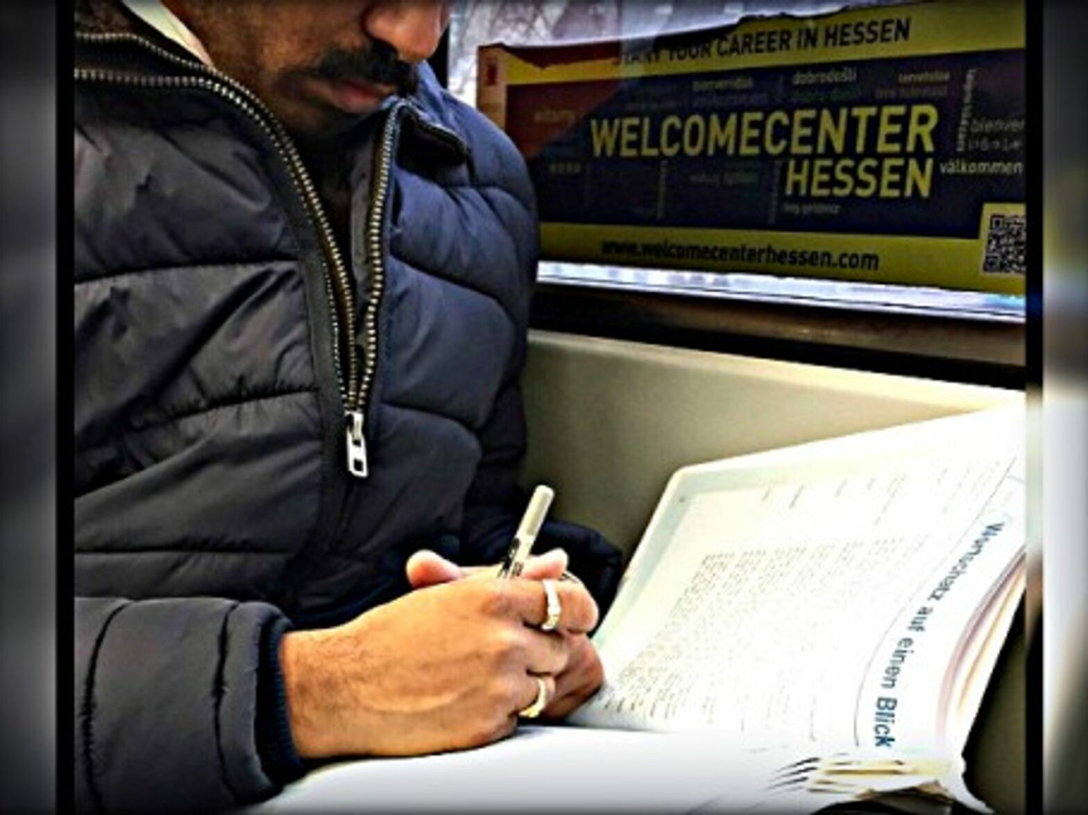 Learning German under a foreign worker program ad in Frankfurt
