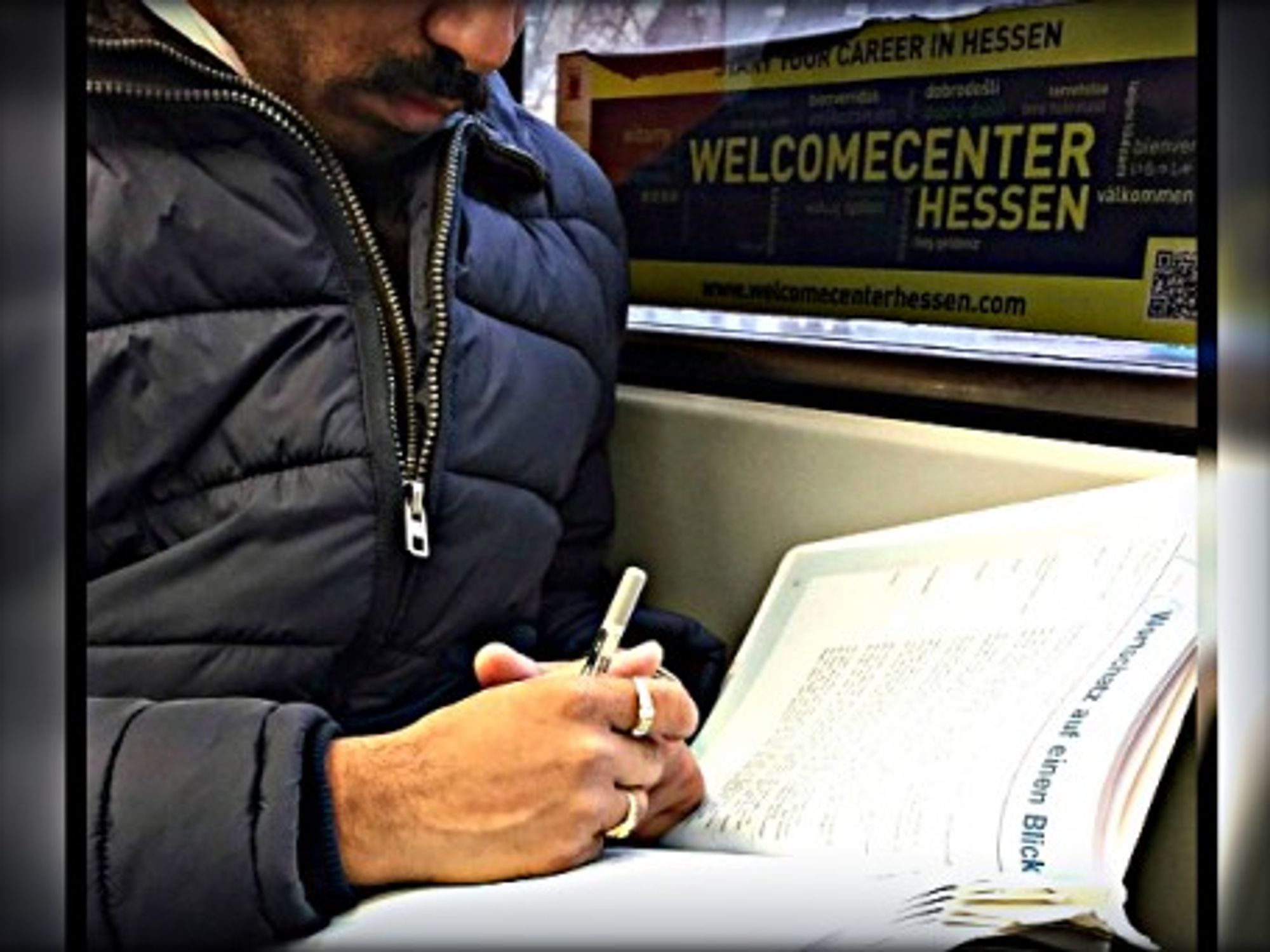 Learning German under a foreign worker program ad in Frankfurt