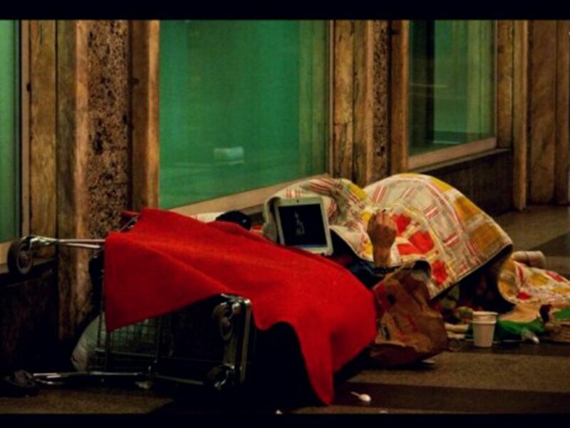 Like this man in Milan, Domenico Codispoti also calls the sidewalk home. Just he can't leave...
