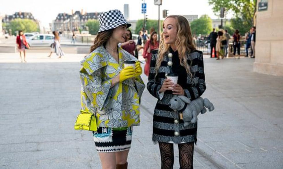 Lily Collins as Emily with Daria Panchenko as her Ukrainian friend Petra