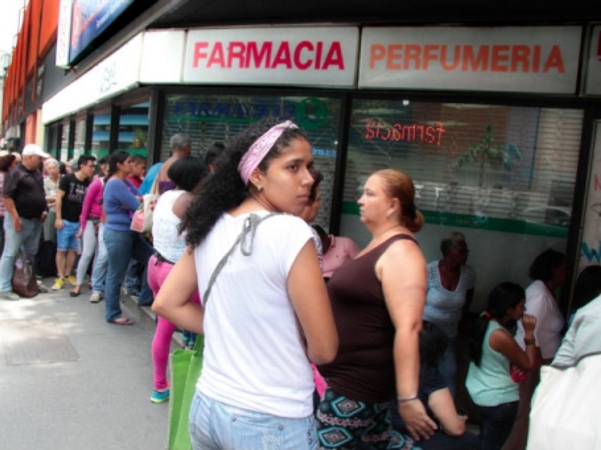 Lines forming outside a Caracas pharmacy in September.
