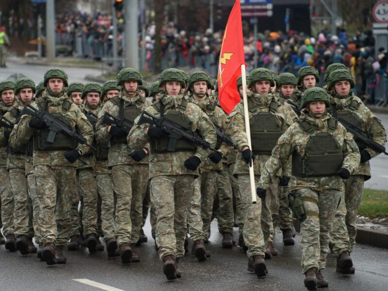 Lithuanian soldiers march during a military parade during Armed Forces Day in Vilnius.