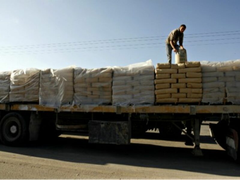 Loading cement on a truck in Rafah