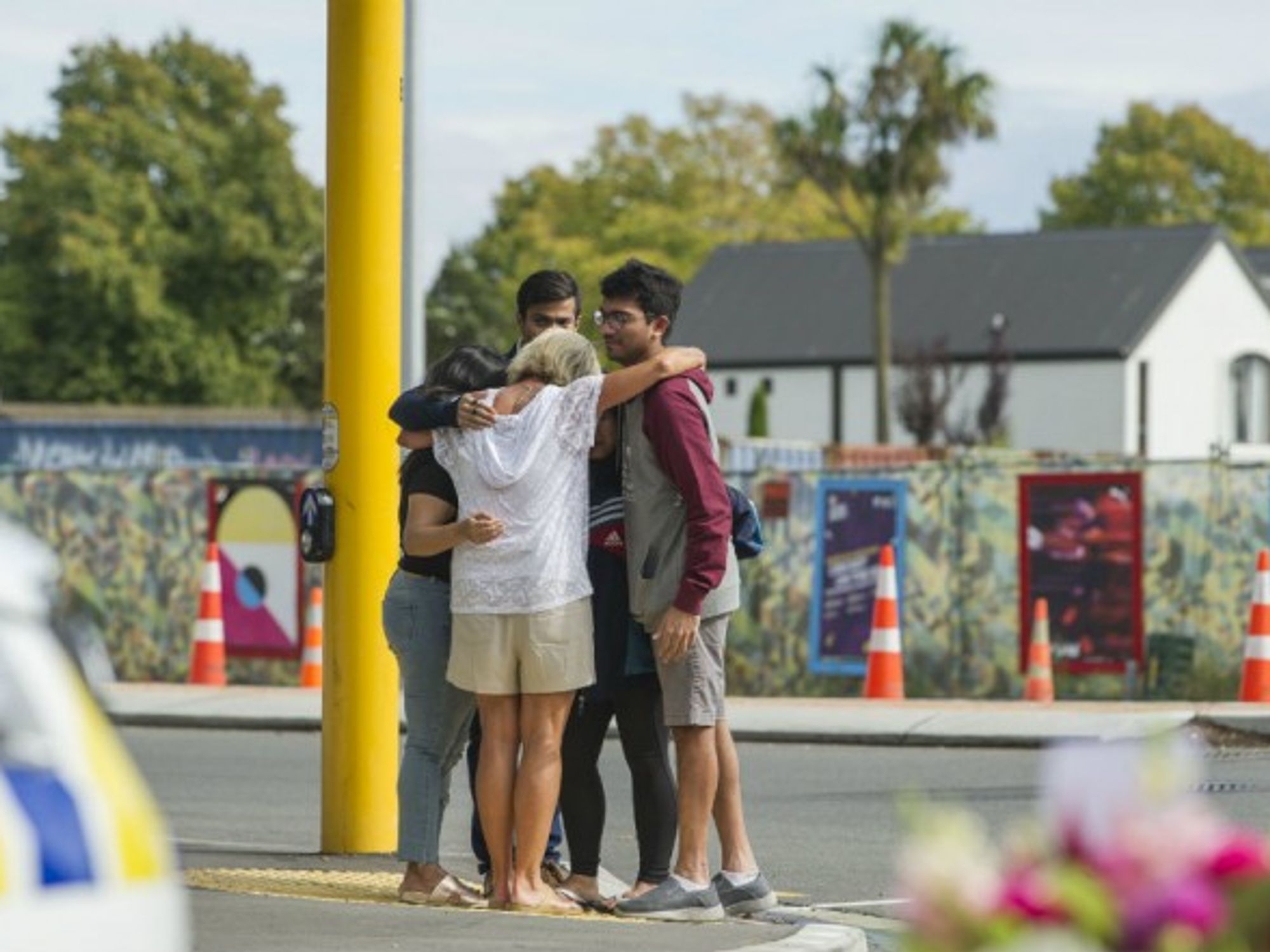Locals pay respect near site of mosque attack in Christchurch, NZ