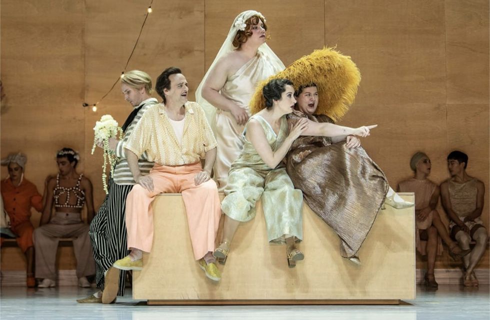 Lucia Lucas and troupe are dressed in soft pastel costumes s they perform Lili Elbe's story for the opera