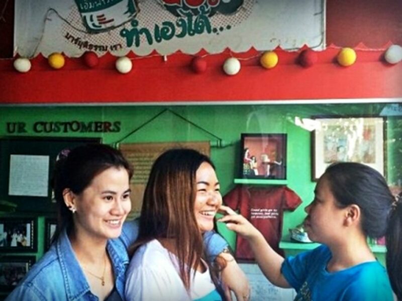 Mai, Peung and Fah in front of their bar in Chiang Mai