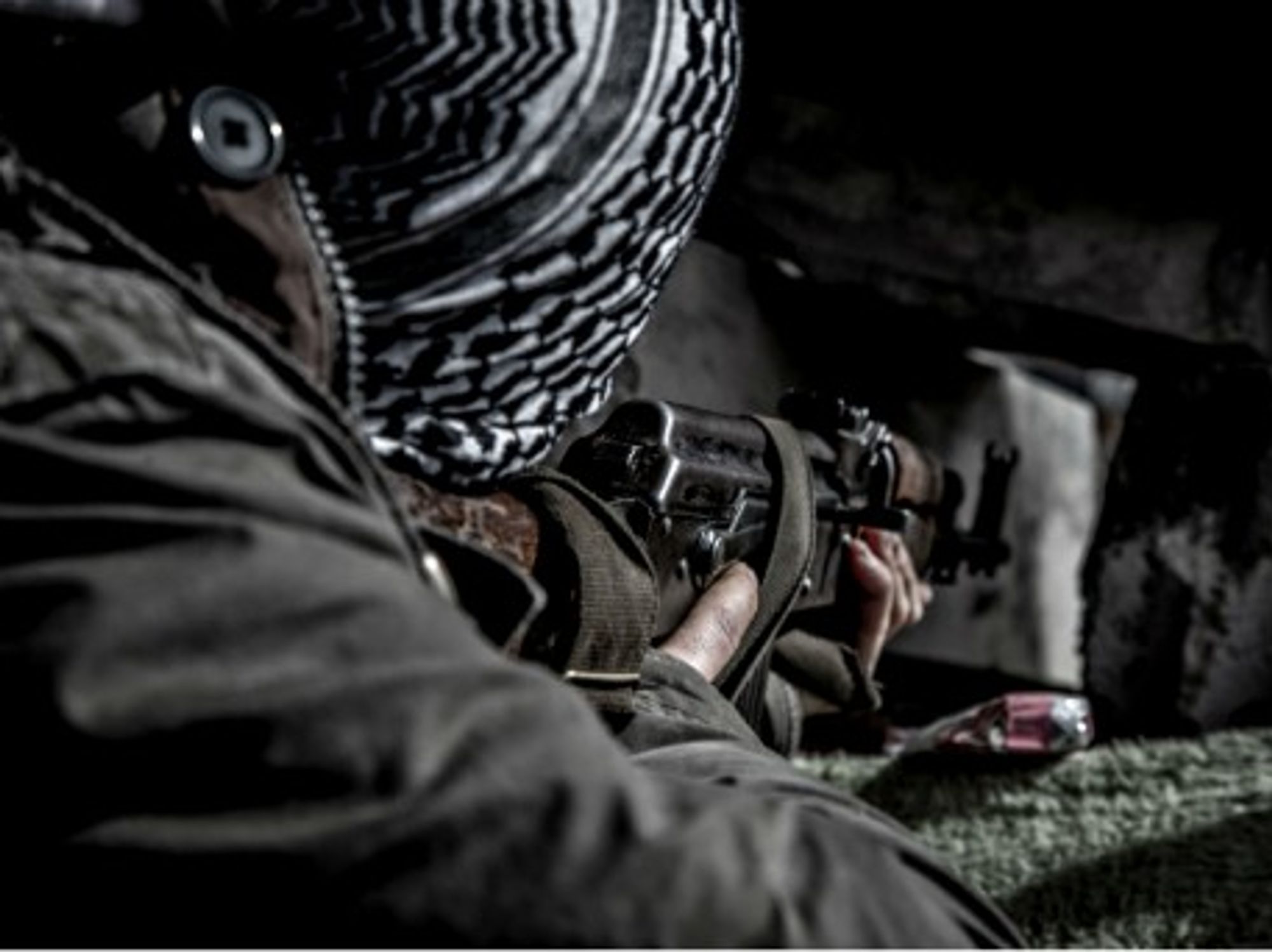 Man practicing shooting in Kobane, Syria