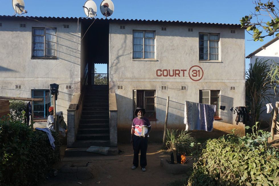 Man standing outside a building.