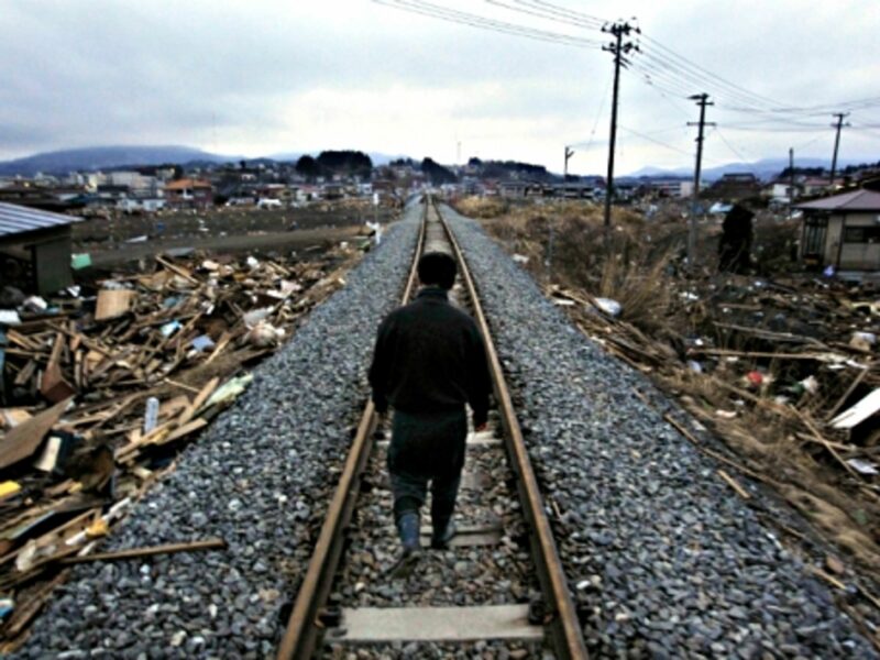 Man walking in Kesennuma, Tohoku, after the March 2011 earthquake